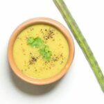 drumstick soup in bowl.