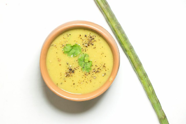 drumstick soup in bowl.