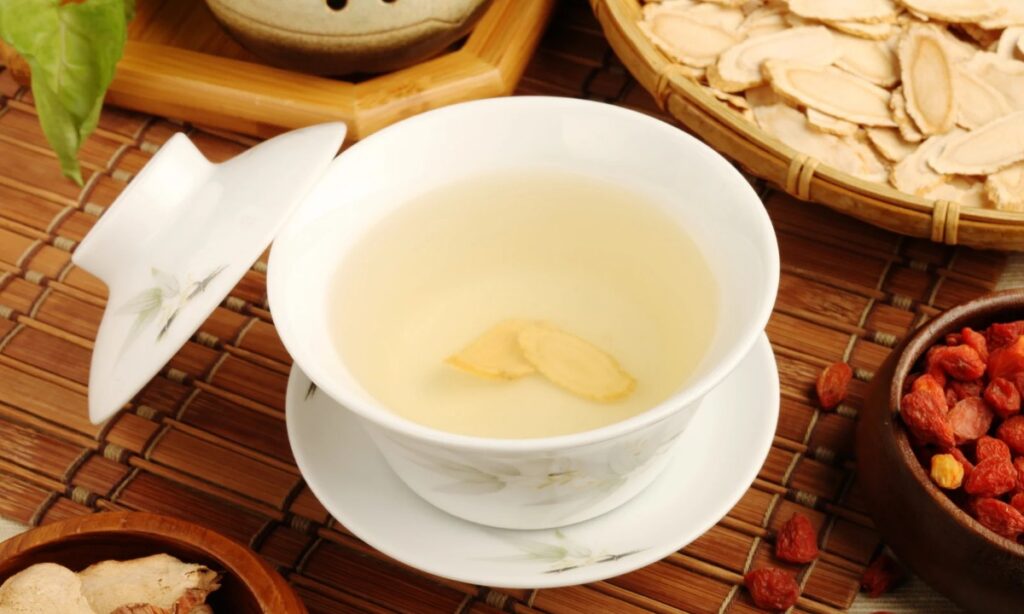 Korean ginseng tea or Insam Cha in white color cup.