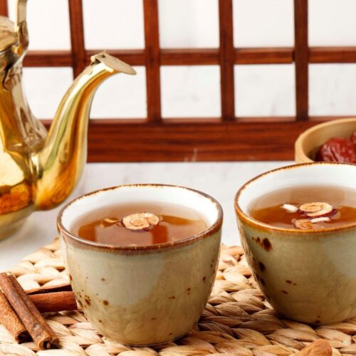 sujeonggwa or korean cinnamon tea in cup