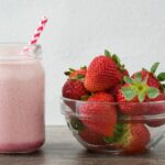 korean strawberry milk in the jar with straw.